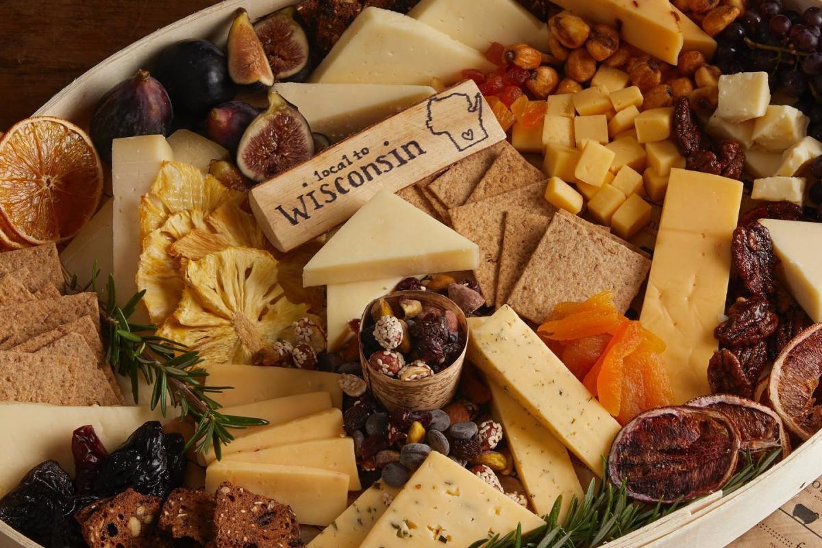 A cheese platter from Fromagination filled with Wisconsin cheeses