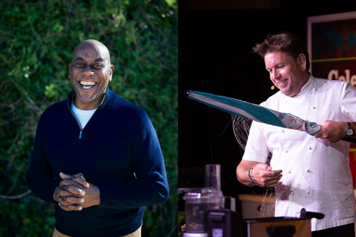 James Martin chef dressed in whites with umbrella at cookery demonstration