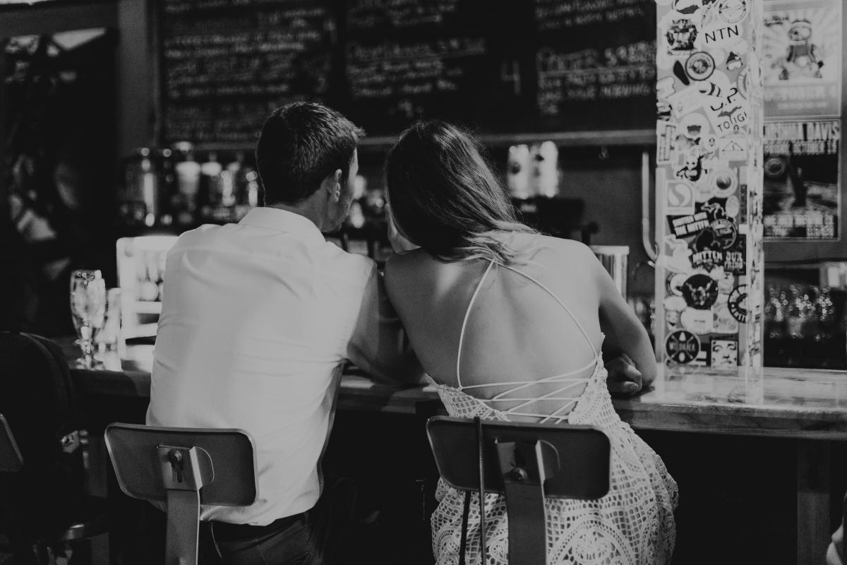 A newlywed couple grabs drinks at Ore Dock Brewing Co after eloping.