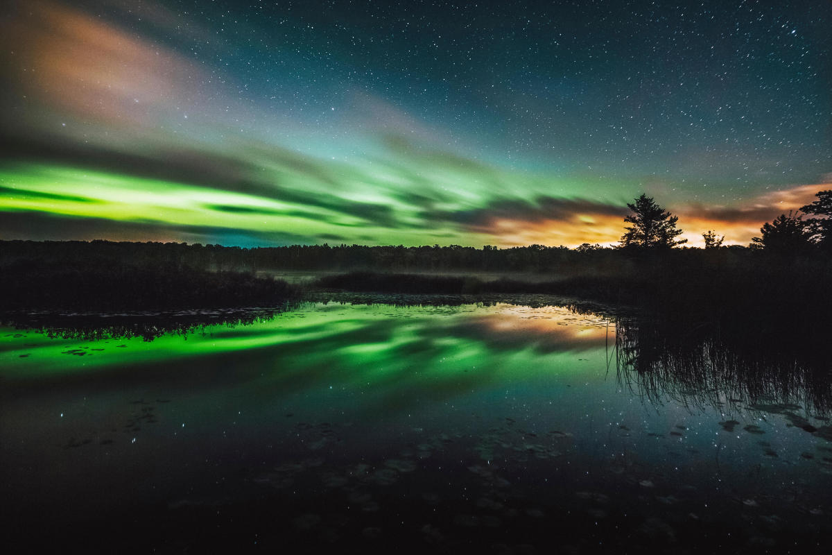 Green Auroras over the sky in Big Bay, MI