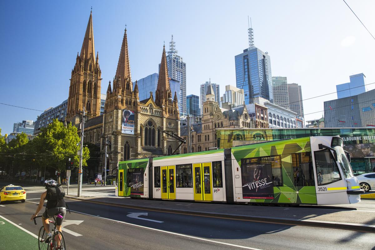 Melbourne Tram with city buildings in background