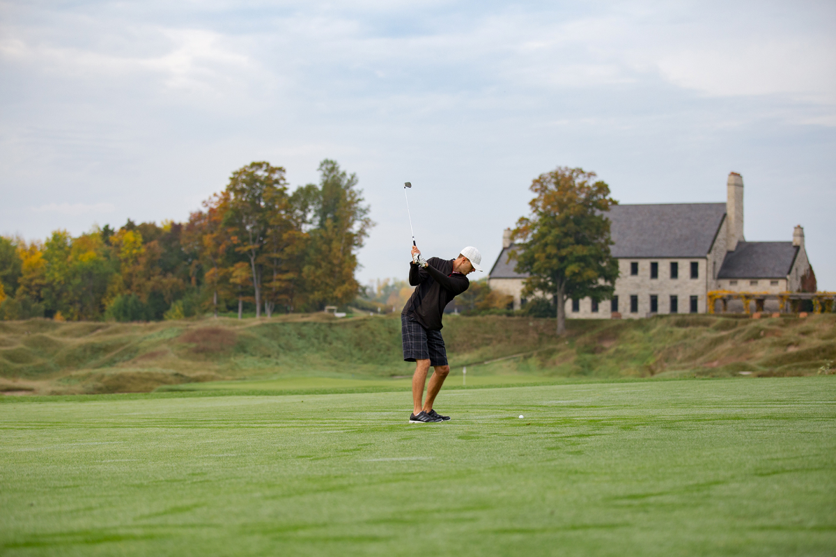 Golf Swinging Iron at Whistling Straits Golf Course