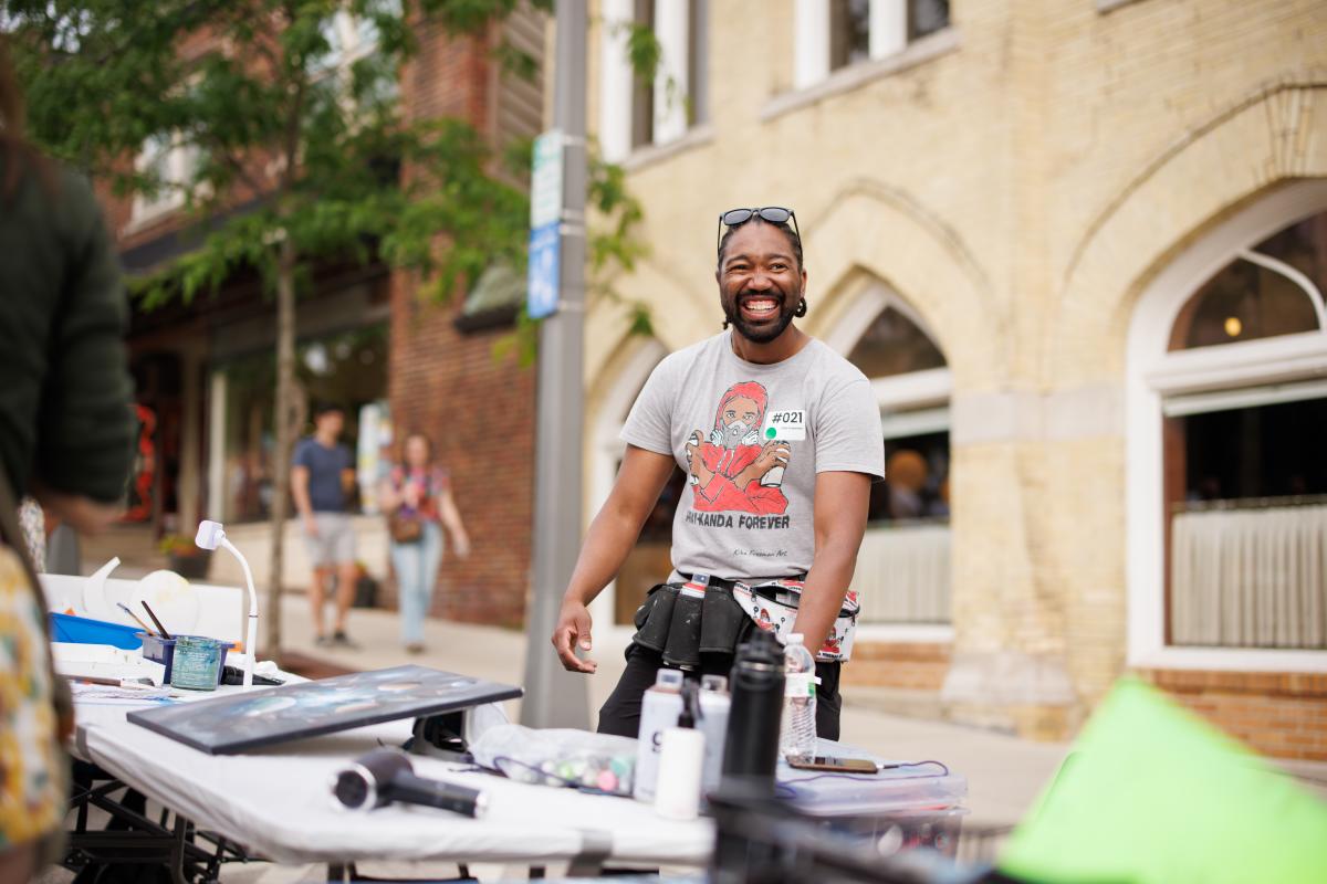Artist smiling at ART 64