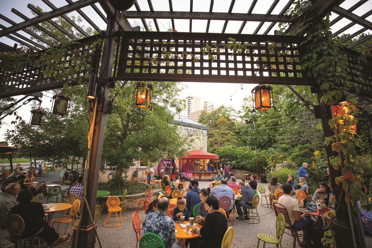 Crowds gather beneath the pergola for an outdoor concert at Colectivo Coffee on Milwaukee’s lakefront.