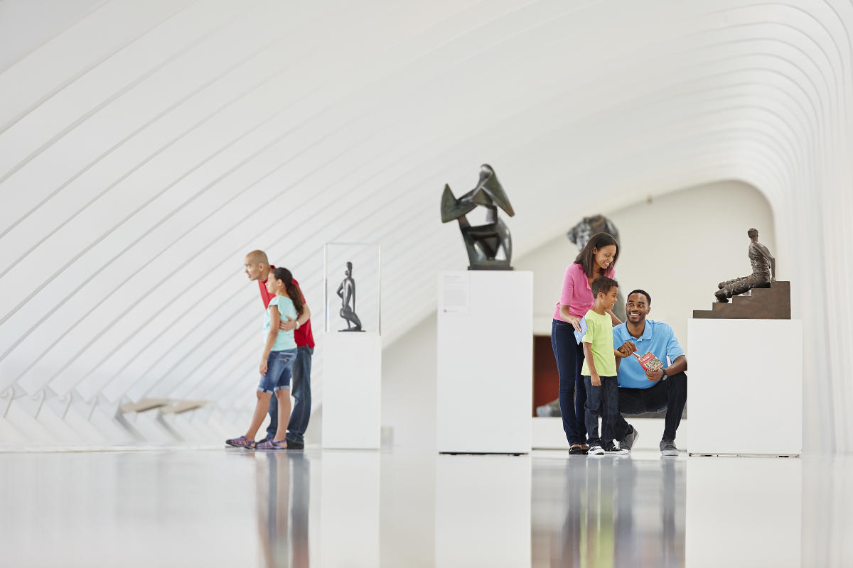 Familes looking around the Milwaukee Art Museum