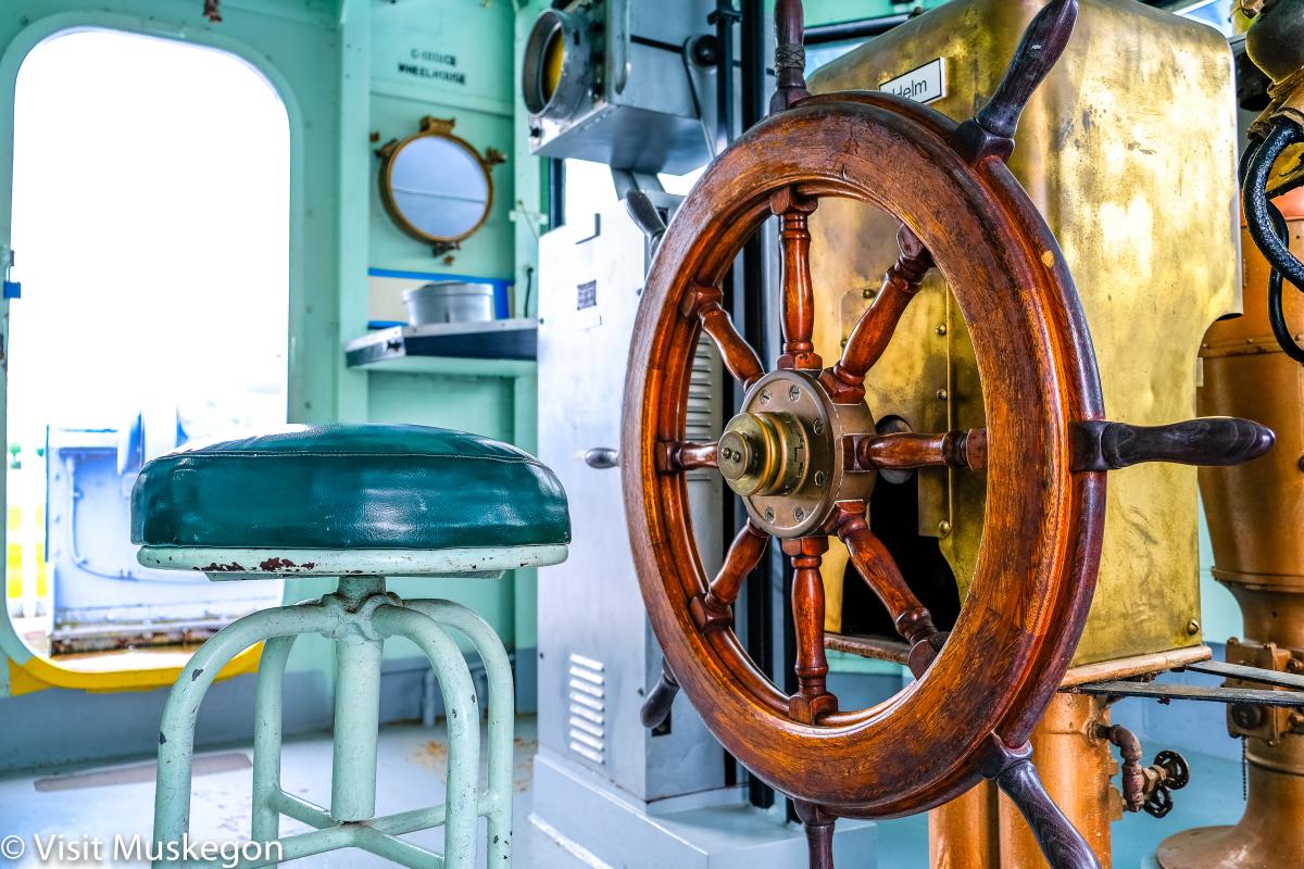 USS LST 393 Captains chair and wheel in pilot house