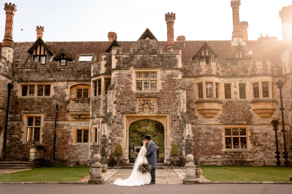 Rhinefield House Hotel - Couple outside hotel