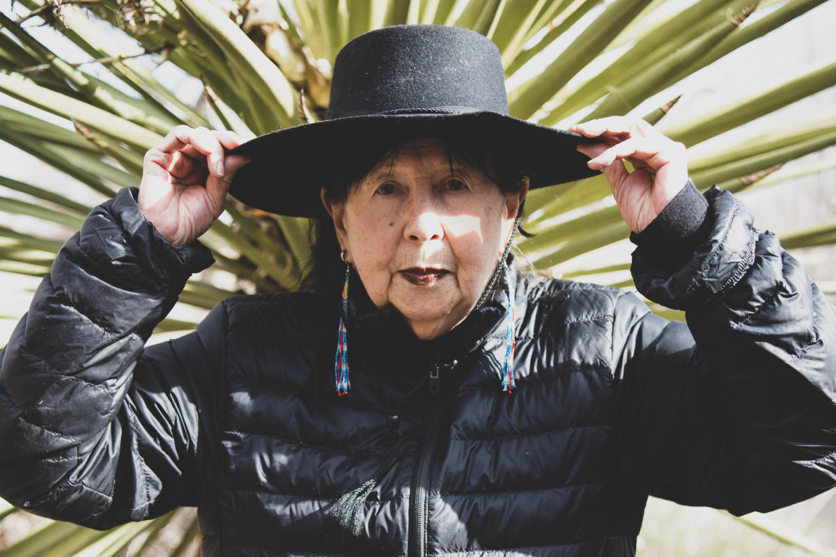 A Chinese woman visiting Santa Fe, New Mexico, wears a Louis