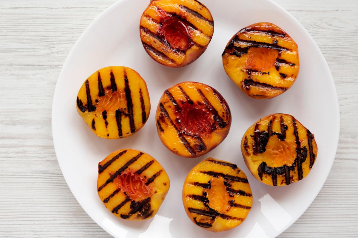 Plate of grilled peaches.
