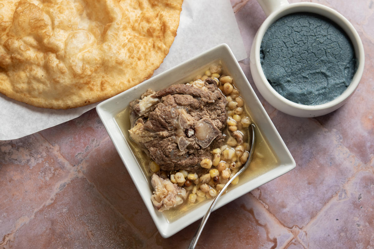 A hearty stew of steamed Navajo corn and tender roasted mutton.