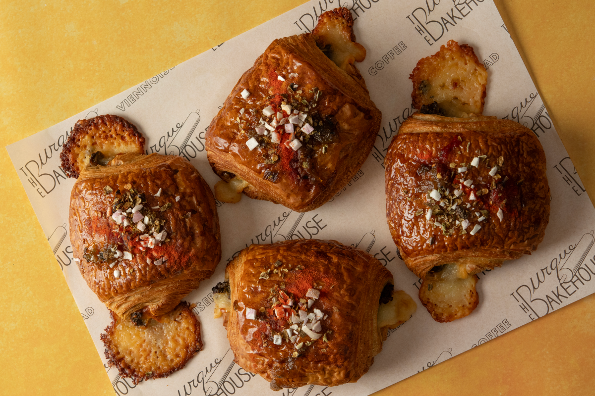 A buttery croissant filled with spicy green chile and cheese.