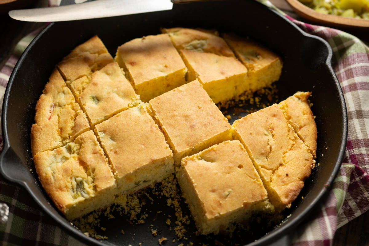 Gluten-Free Green Chile Cornbread surrounded by raw ingredients.