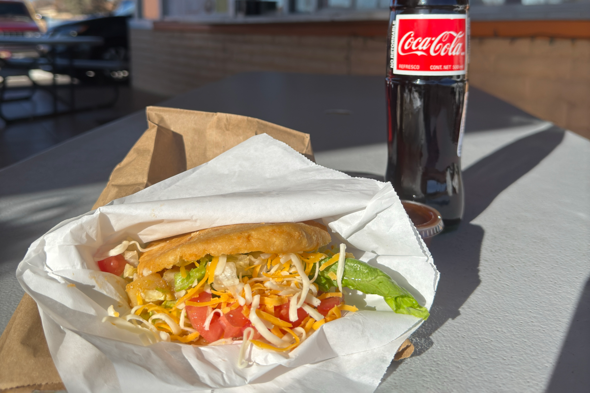 Golden fried gordita stuffed with seasoned beef and green chile.