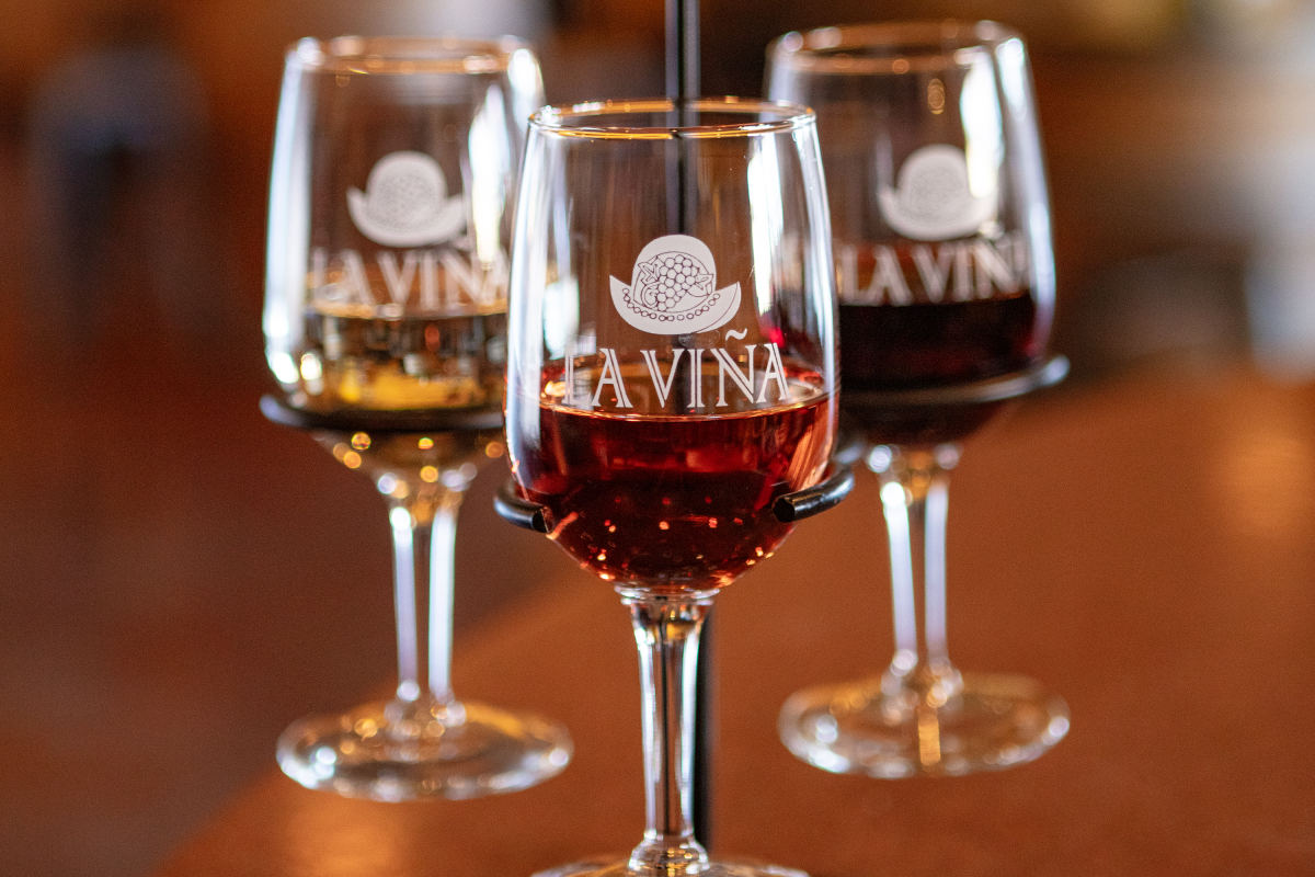 Three La Viña Winery wine glasses.