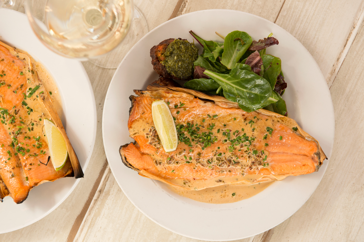 Fresh trouth grilled in corn husks and topped with smoky chipotle cream.