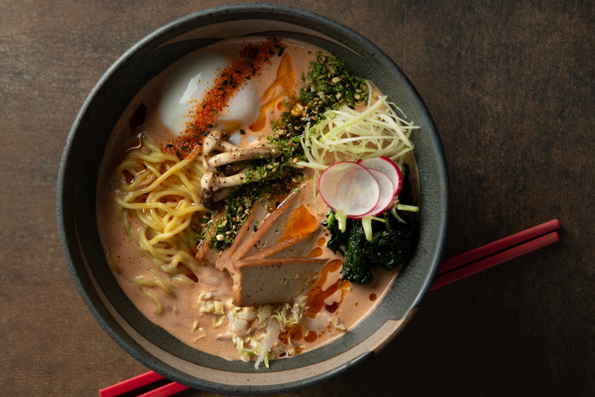 Creamy pecan broth loaded with local vegetables and bold flavors.