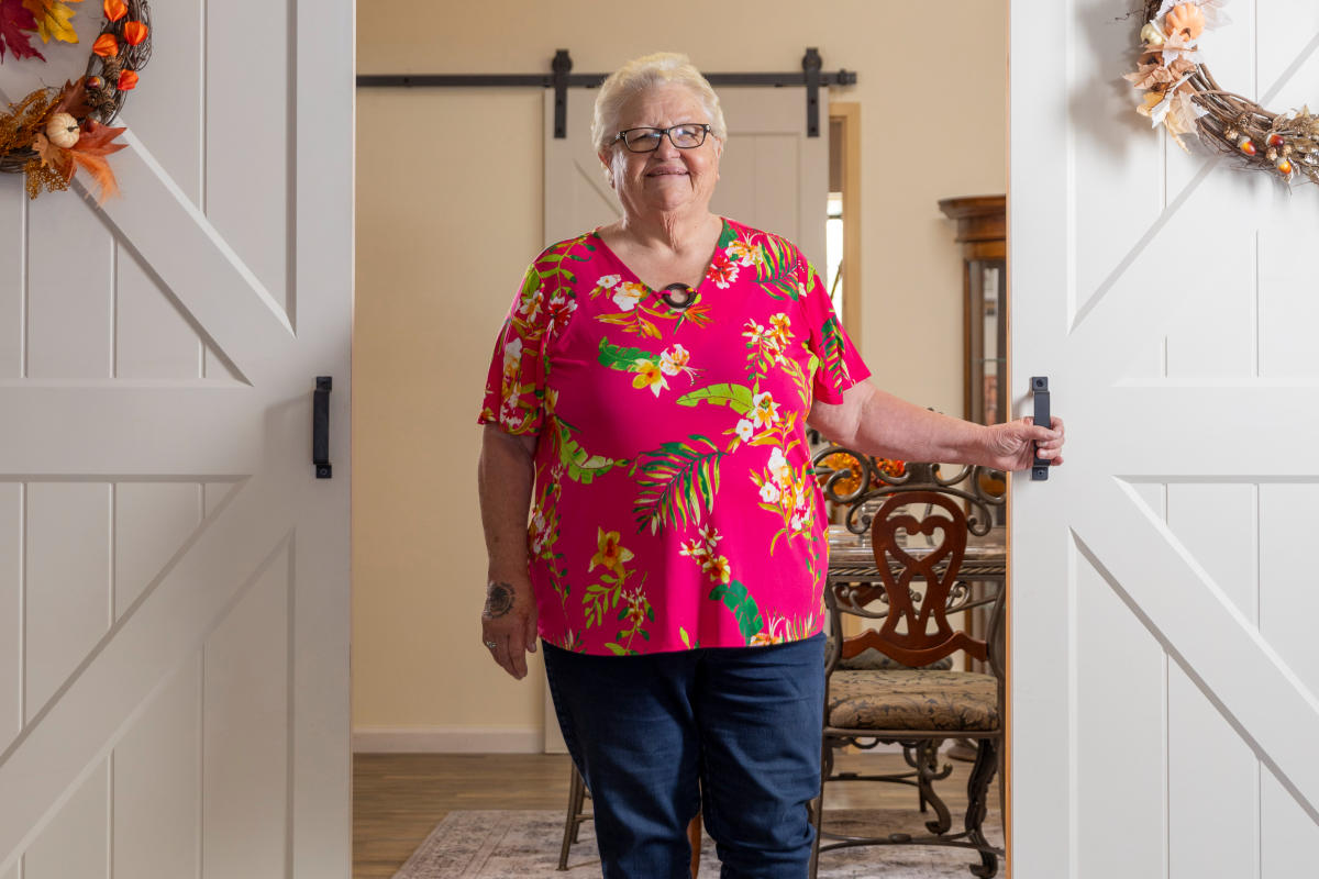 Patricia Morales-Cano stands in the doorway of the Silver City warming center.