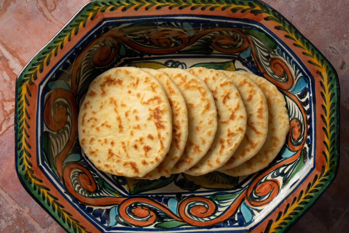 A colorful plate of six Mesa Provisions duck fat flour tortillas.