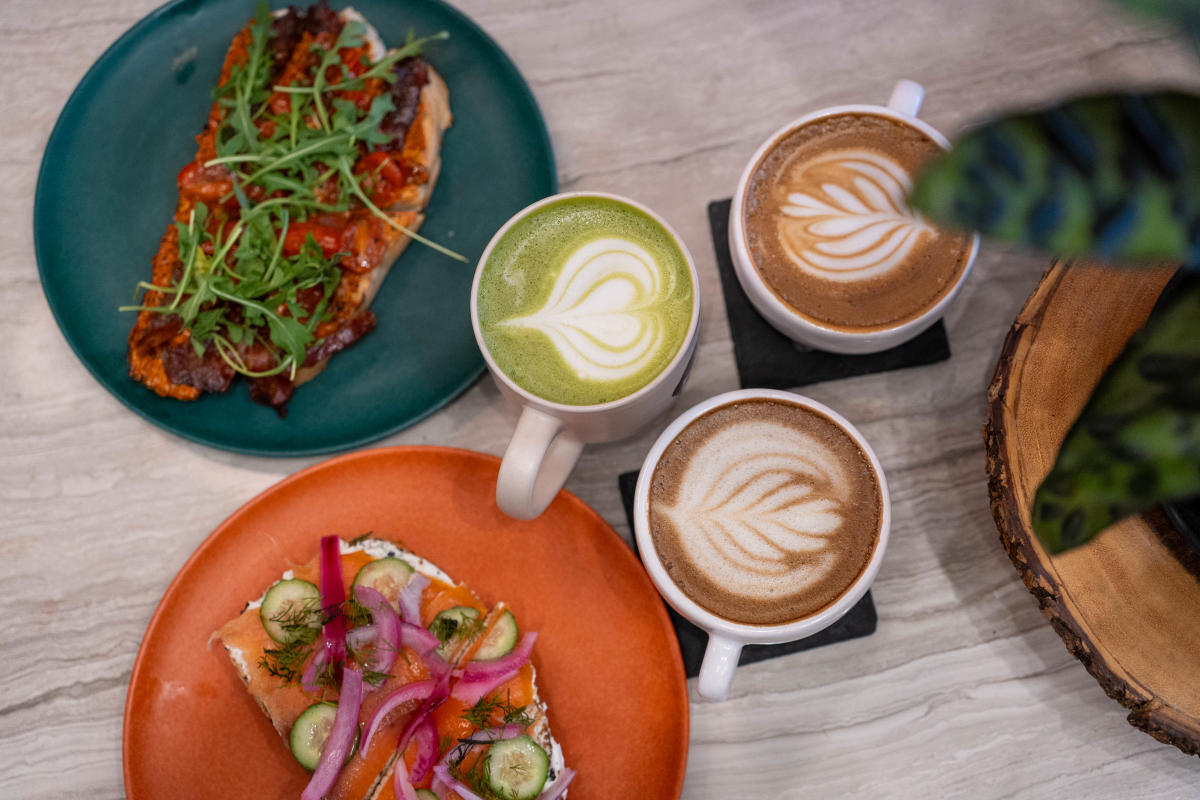 Photo of latte and matcha art and food at Toast and Coffee