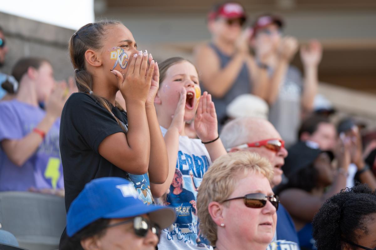 Fans cheer on the OKC Spark softball team