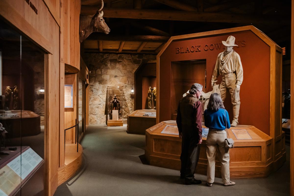 Two people looking at exhibit at the National Cowboy & Western Heritage Museum in Oklahoma City
