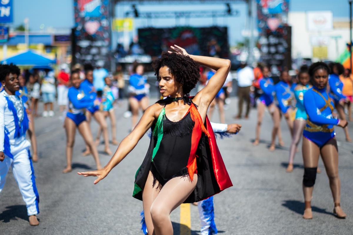 Woman dancing at Juneteenth on the East festival in the East End District