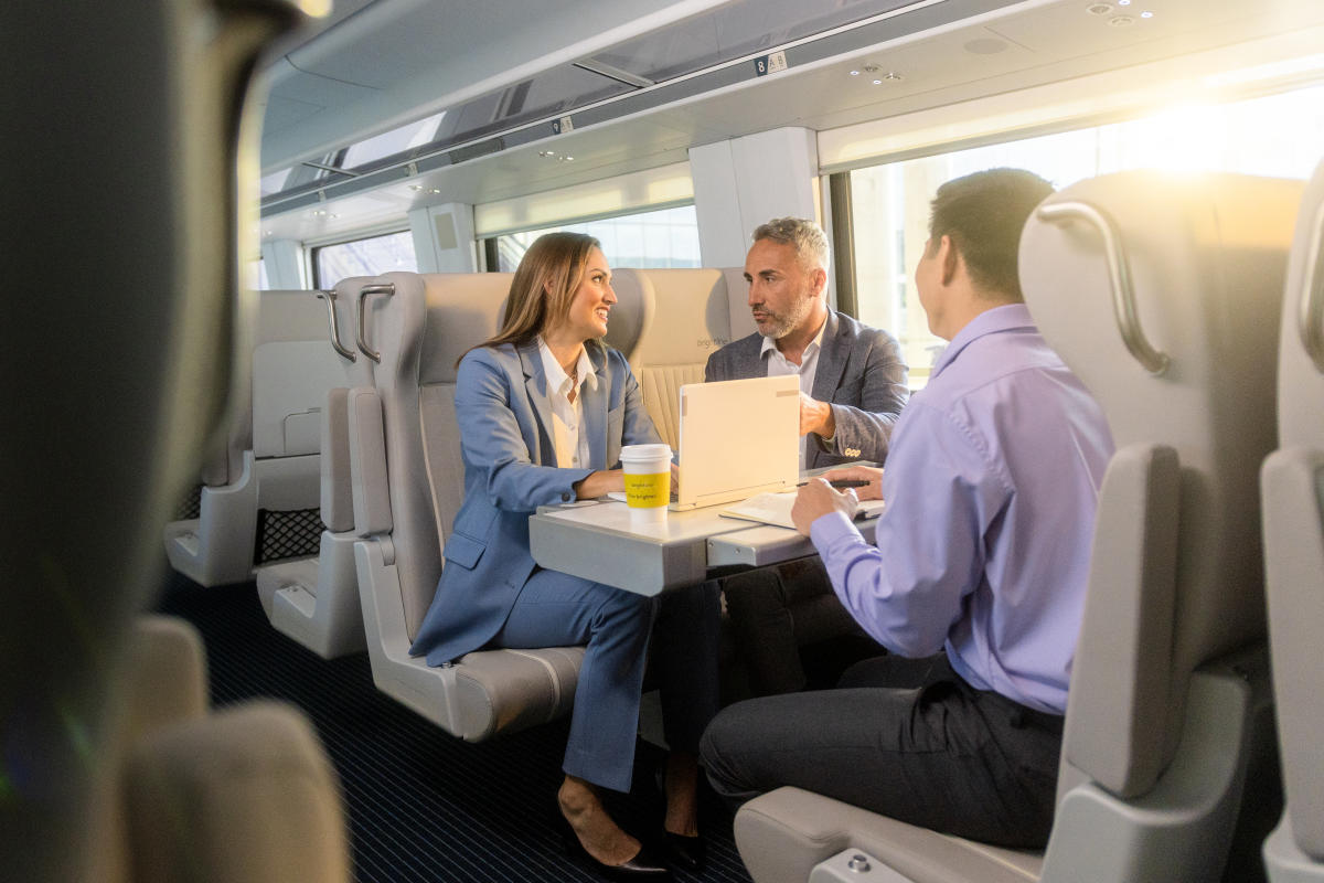 Another view of people at work on Brightline train