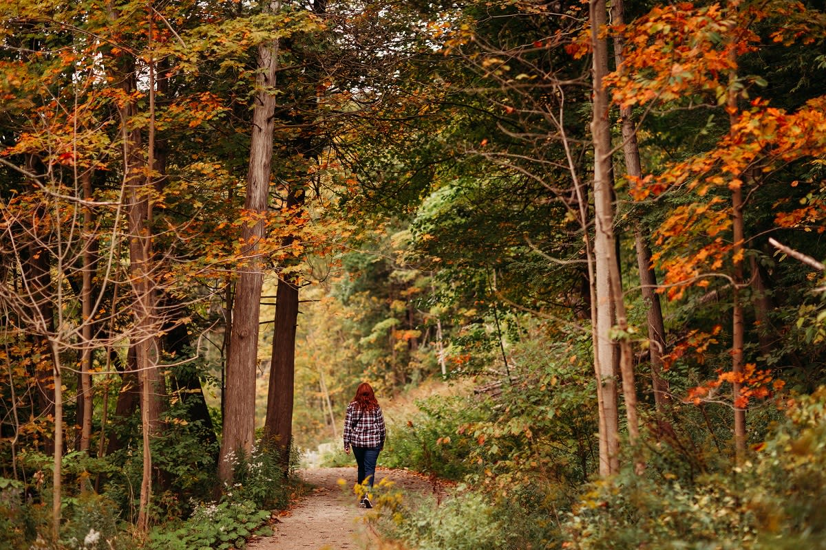 Woman walking in the woods