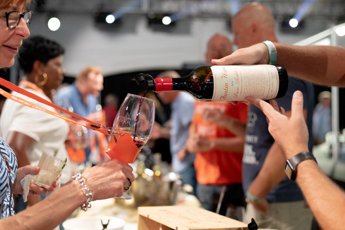 Wine being poured during the 2022 Palm Desert Food & Wine Grand Tasting event.