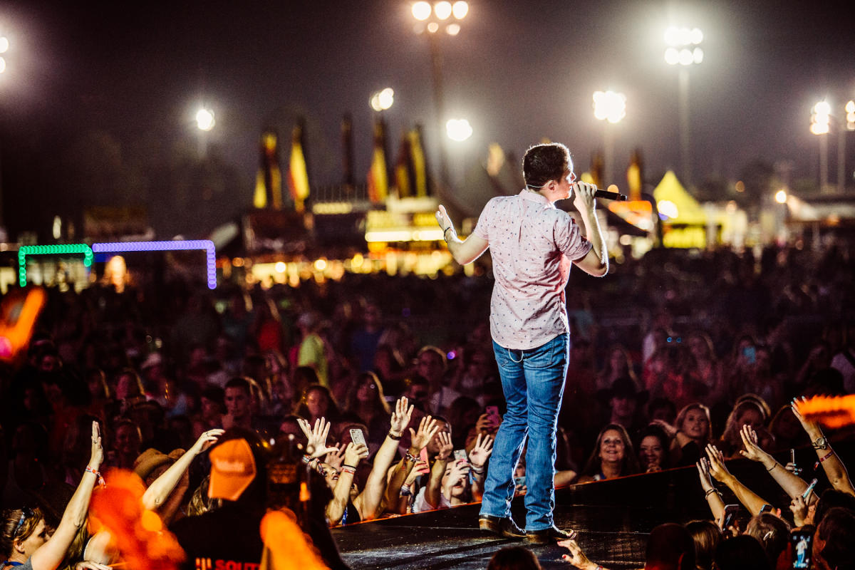 scotty mccreery on stage at gulf coast jam