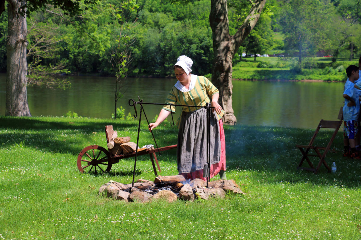 a person cooking BBQ