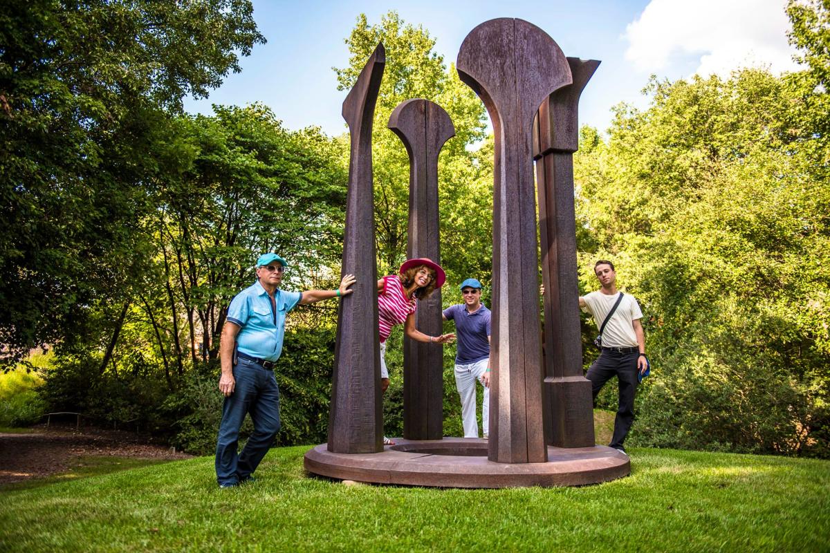 Family interacting with art at Grounds for Sculpture