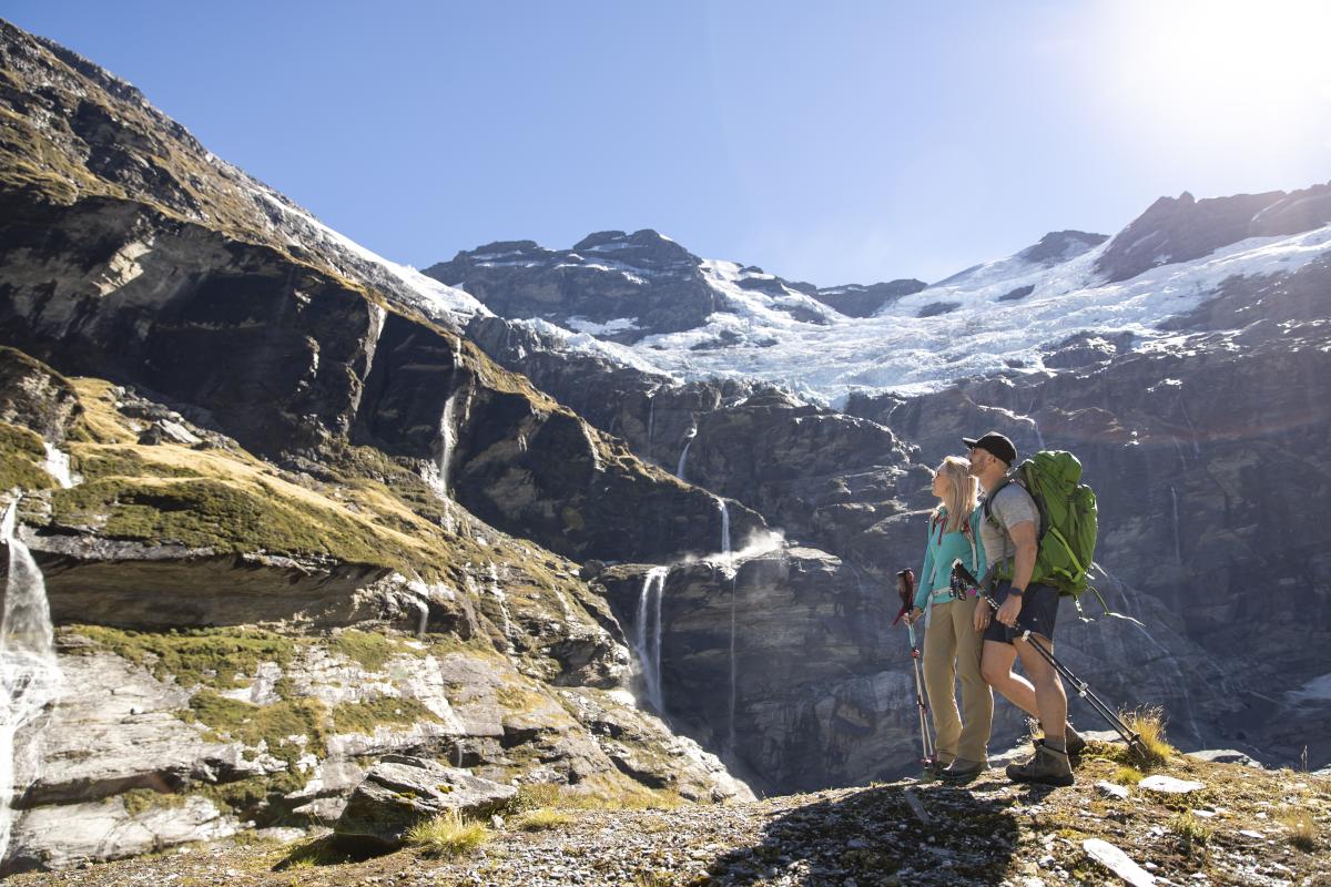 Couple hiking Earnslaw Burn in Spring