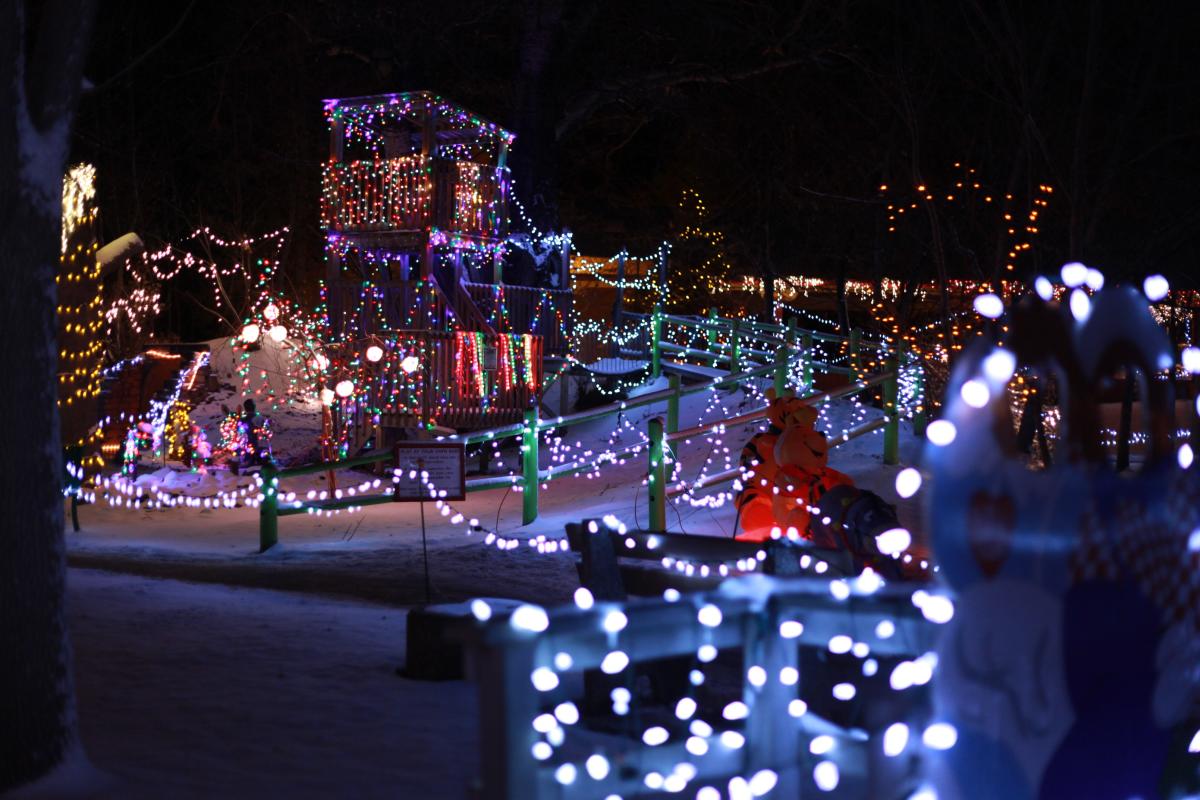 Play ground covered in christmas lights at storybook island's christmas nights of light event in rapid city, sd