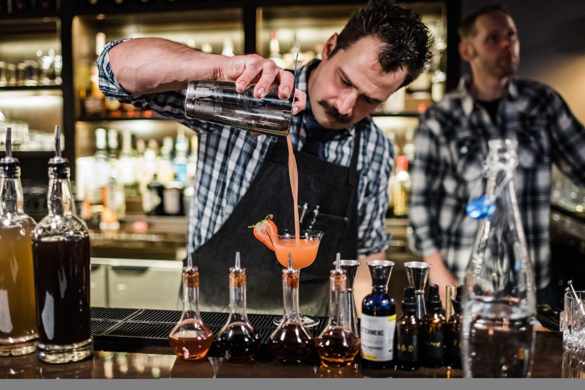 Bartender Pouring a Craft Cocktail