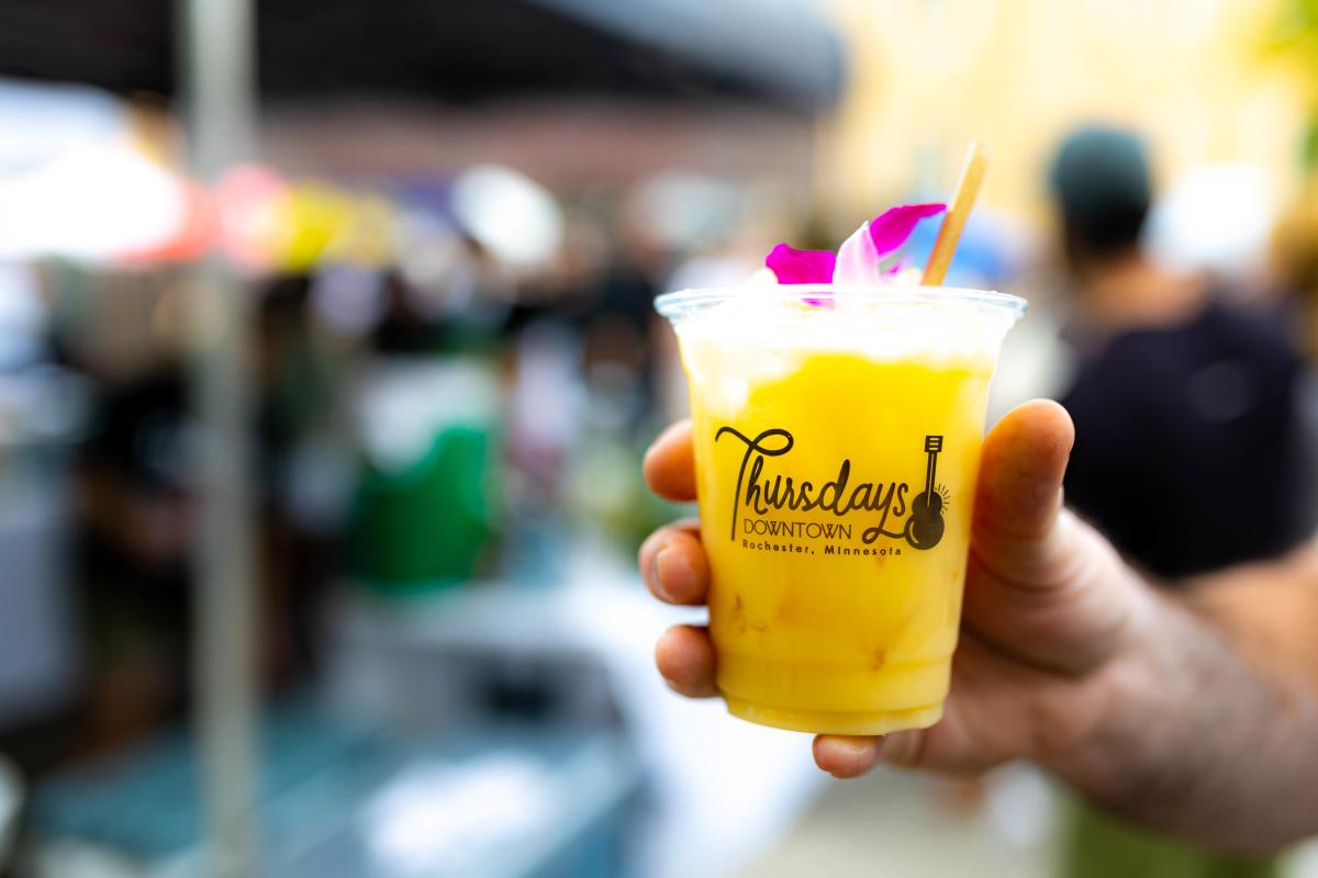 Thursdays Downtown Cup and Logo