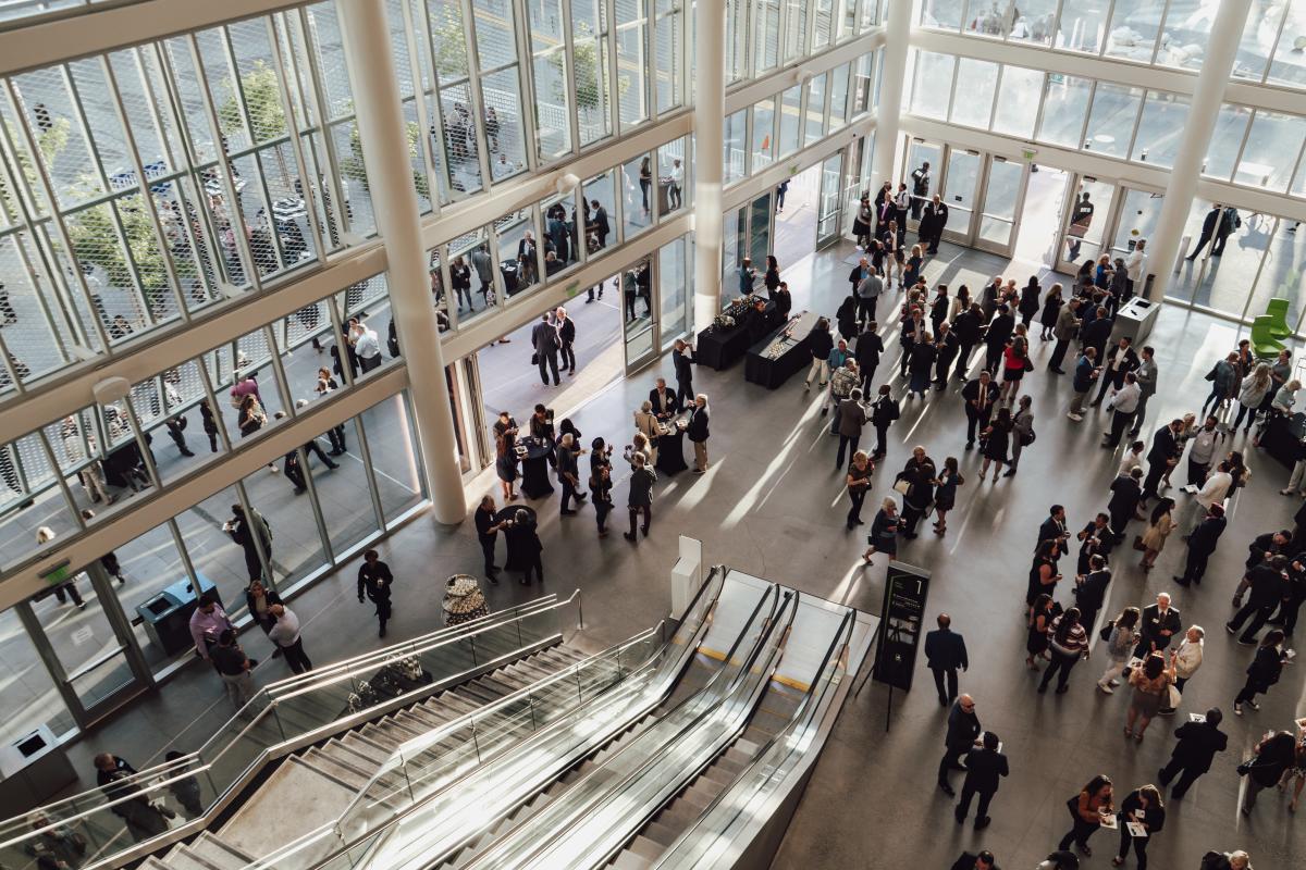 Delegates inside the SAFE Credit Union Convention Center west lobby.