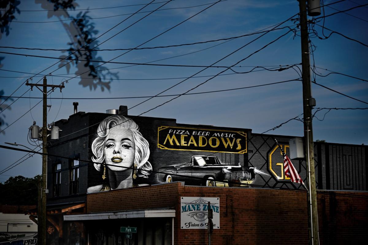 Mural on side of Grove Cartel