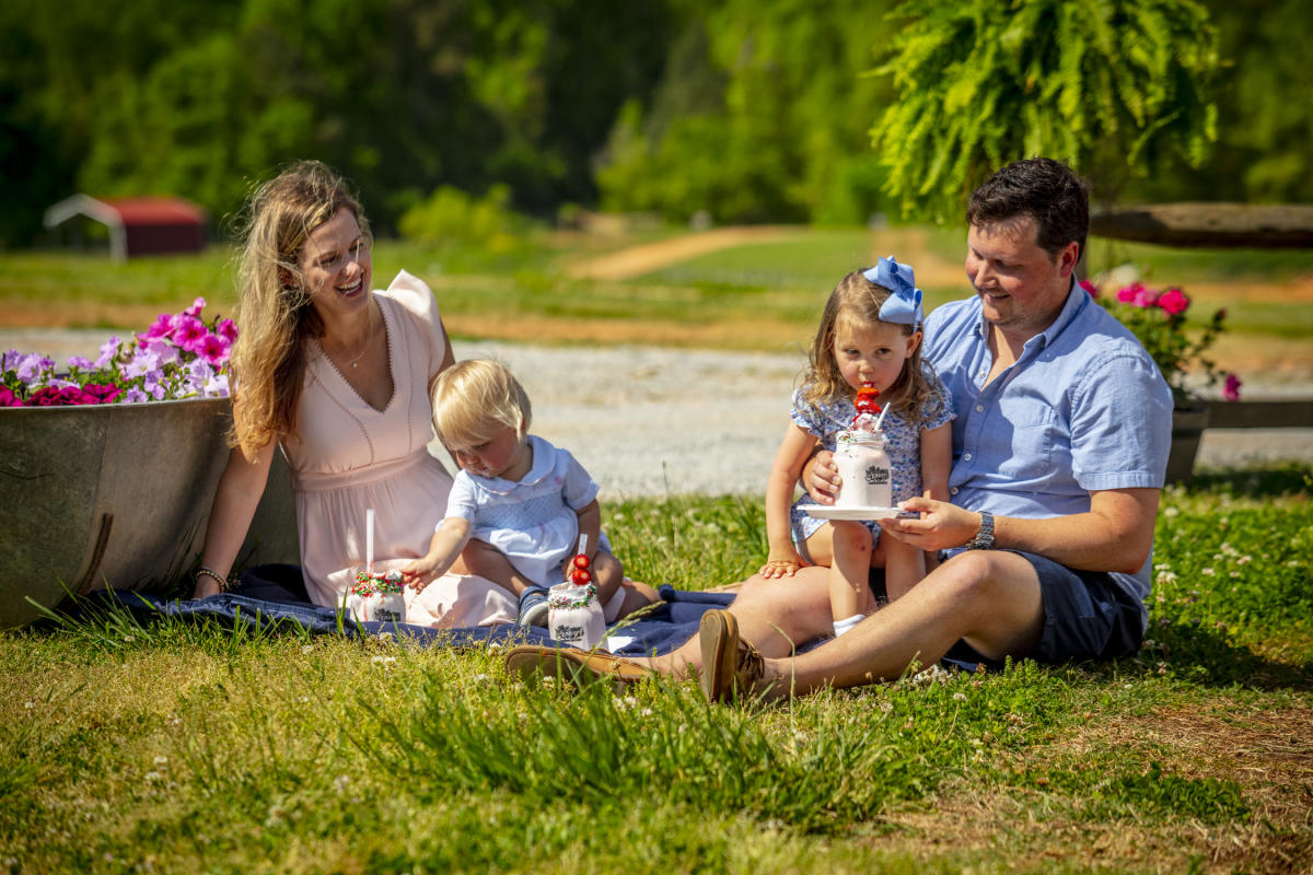 Family drinking milkshakes at Patterson Farm