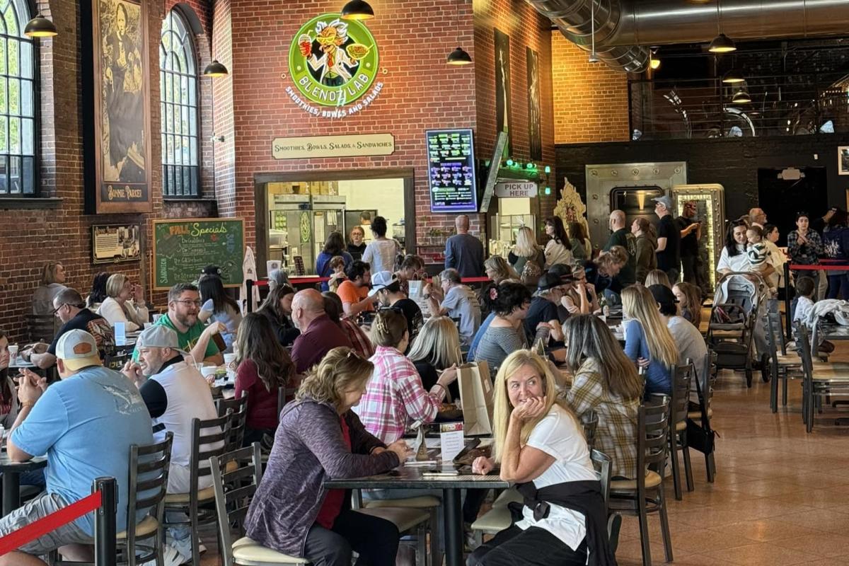 Crowd enjoying food in food hall