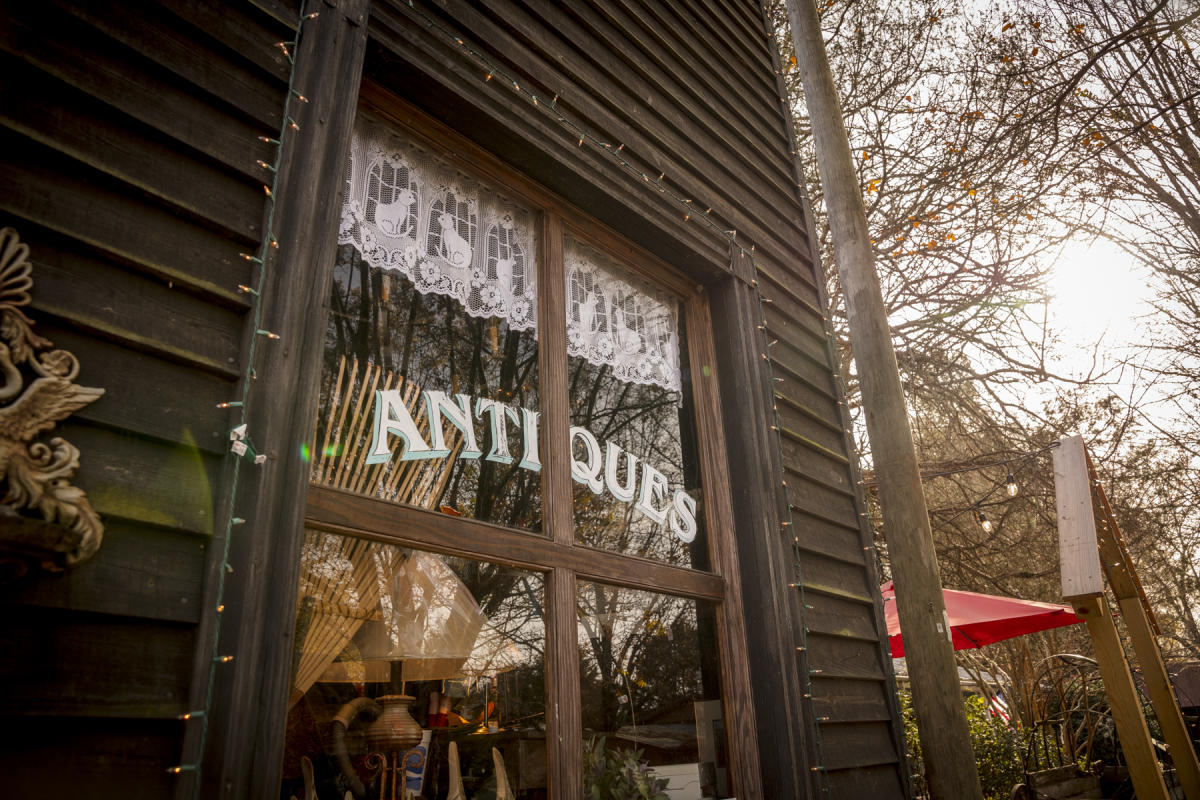 Antiques window sign in Gold Hill