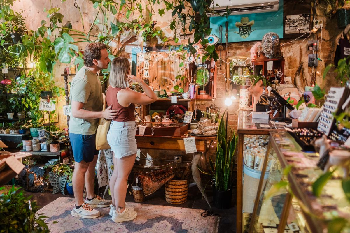A couple shops at Daughter of the Wild in Downtown San Marcos