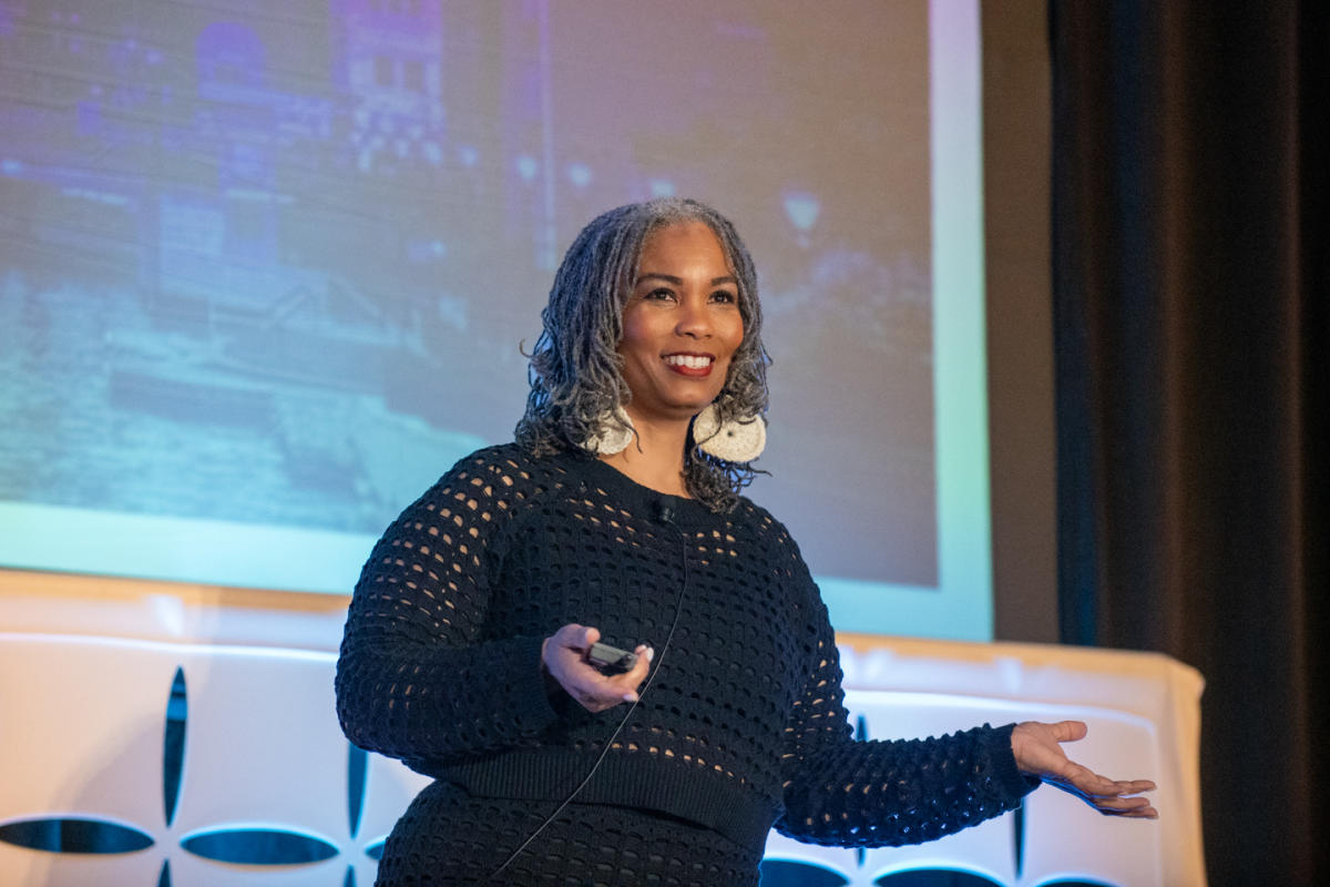 Dr. Stacia Thompson from Sherman Phoenix gives a keynote address at Simpleview Summit
