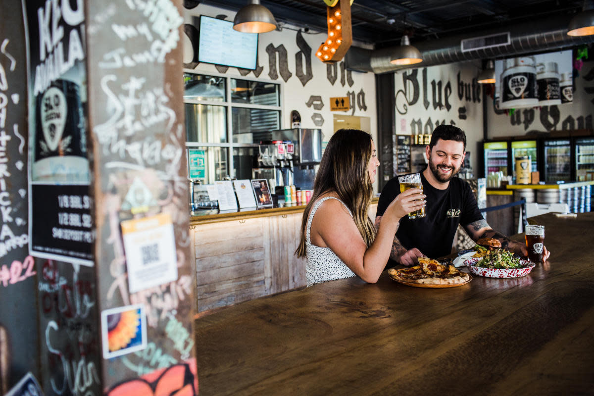 couple eating at SLO Brew Rock