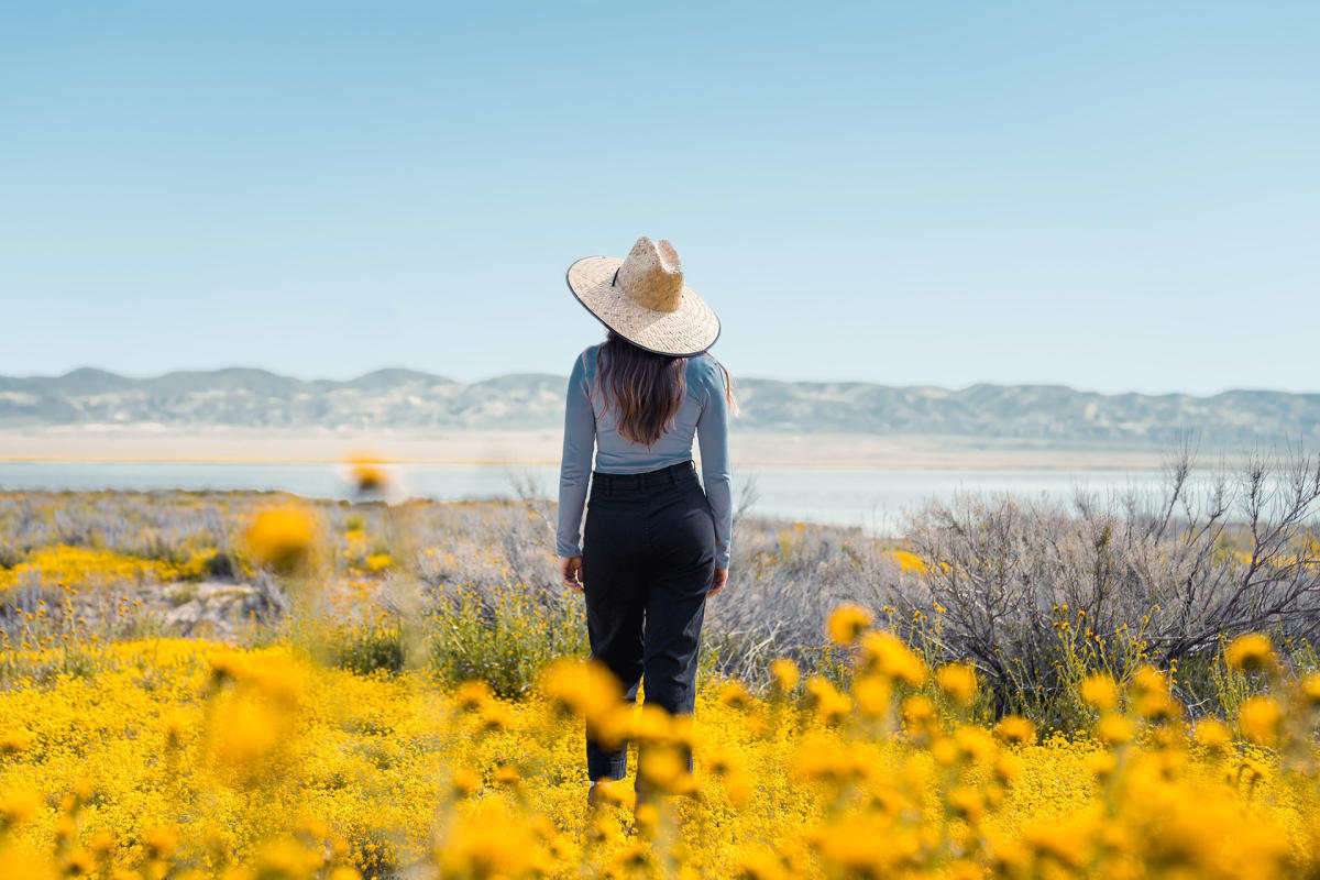 Girl visiting the wildflowers in SLO CAL