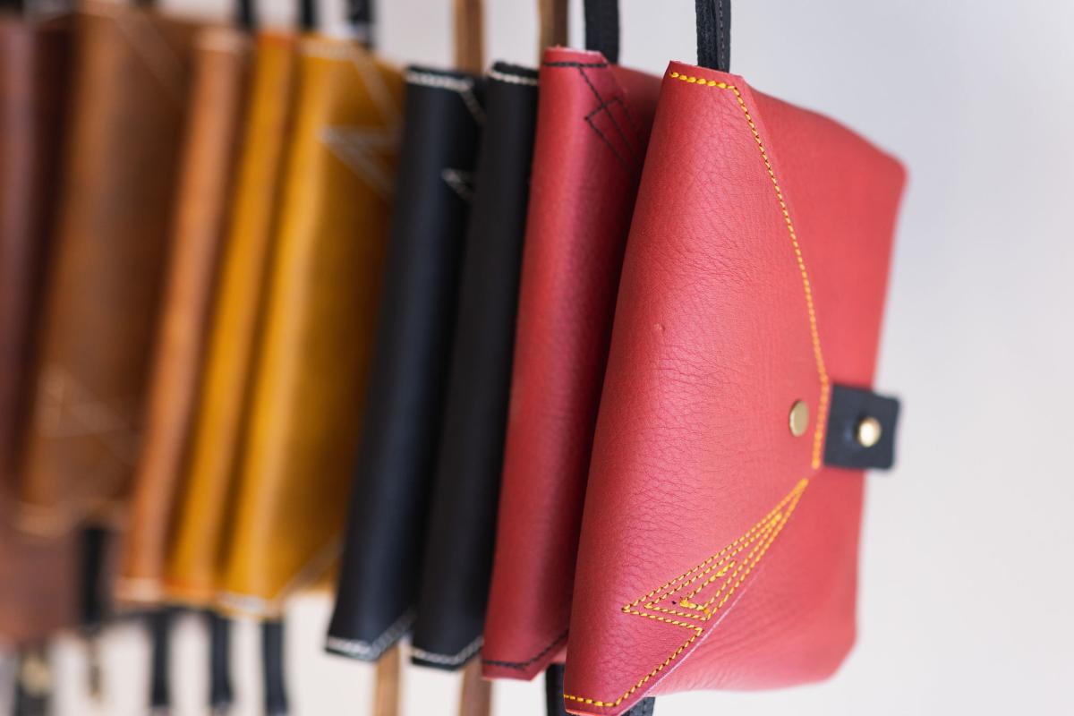 Various colors of leather wallets made by Maven Leather in Cayucos, CA