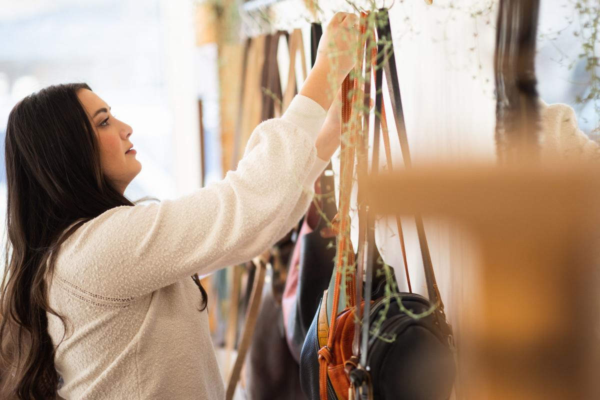 woman shopping at Maven Leather in Cayucos