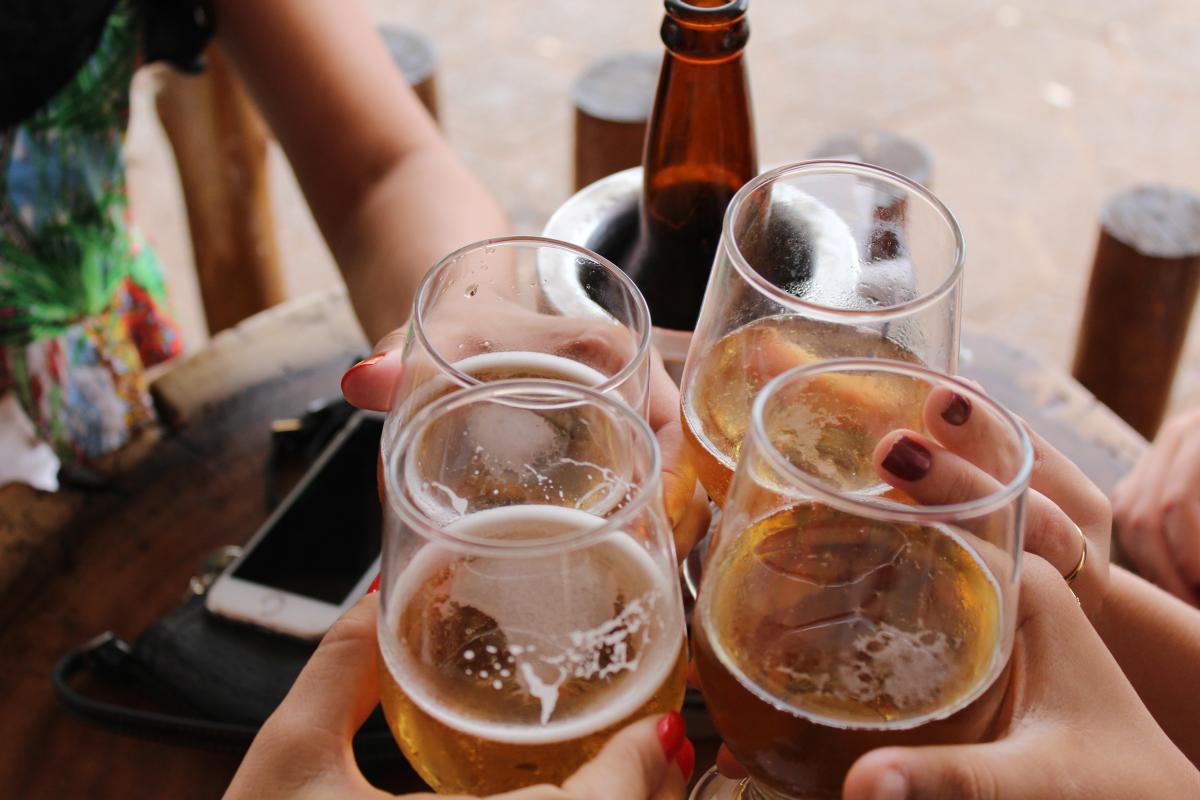 Group of friends with beer in SLO CAL