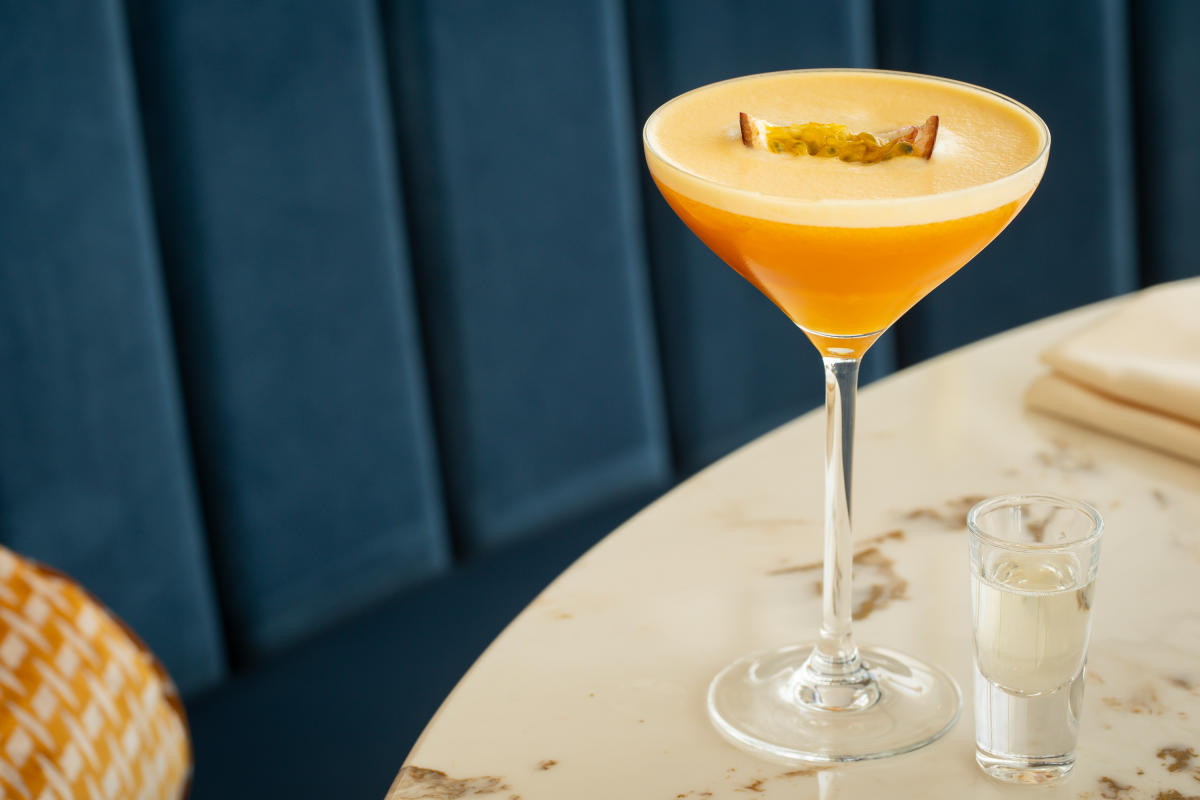 Pornstar martini on marble style circular table at Atlantic Gate