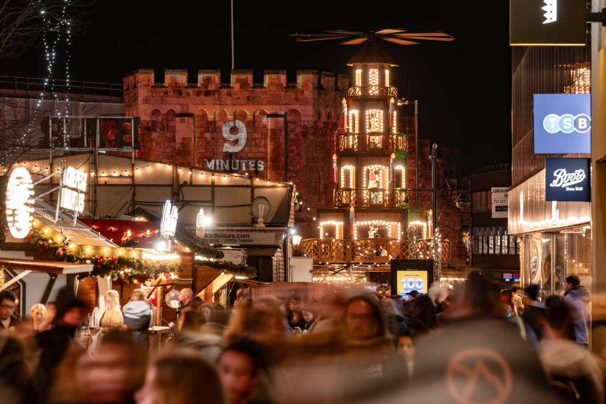 Christmas Market stalls all lit up on Southampton's Above Bar Precinct
